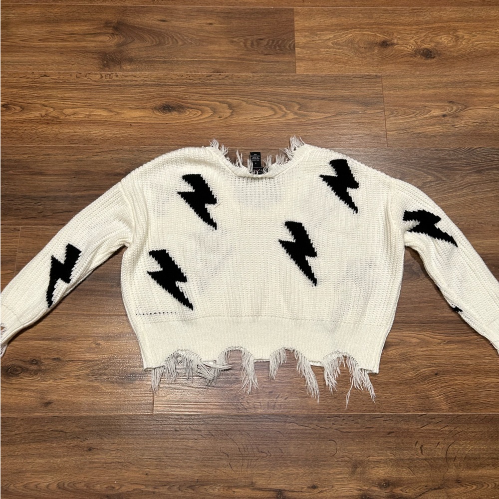 A sweater with little lightning bults